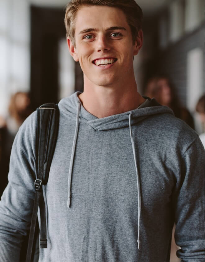 A male student on a college campus,
