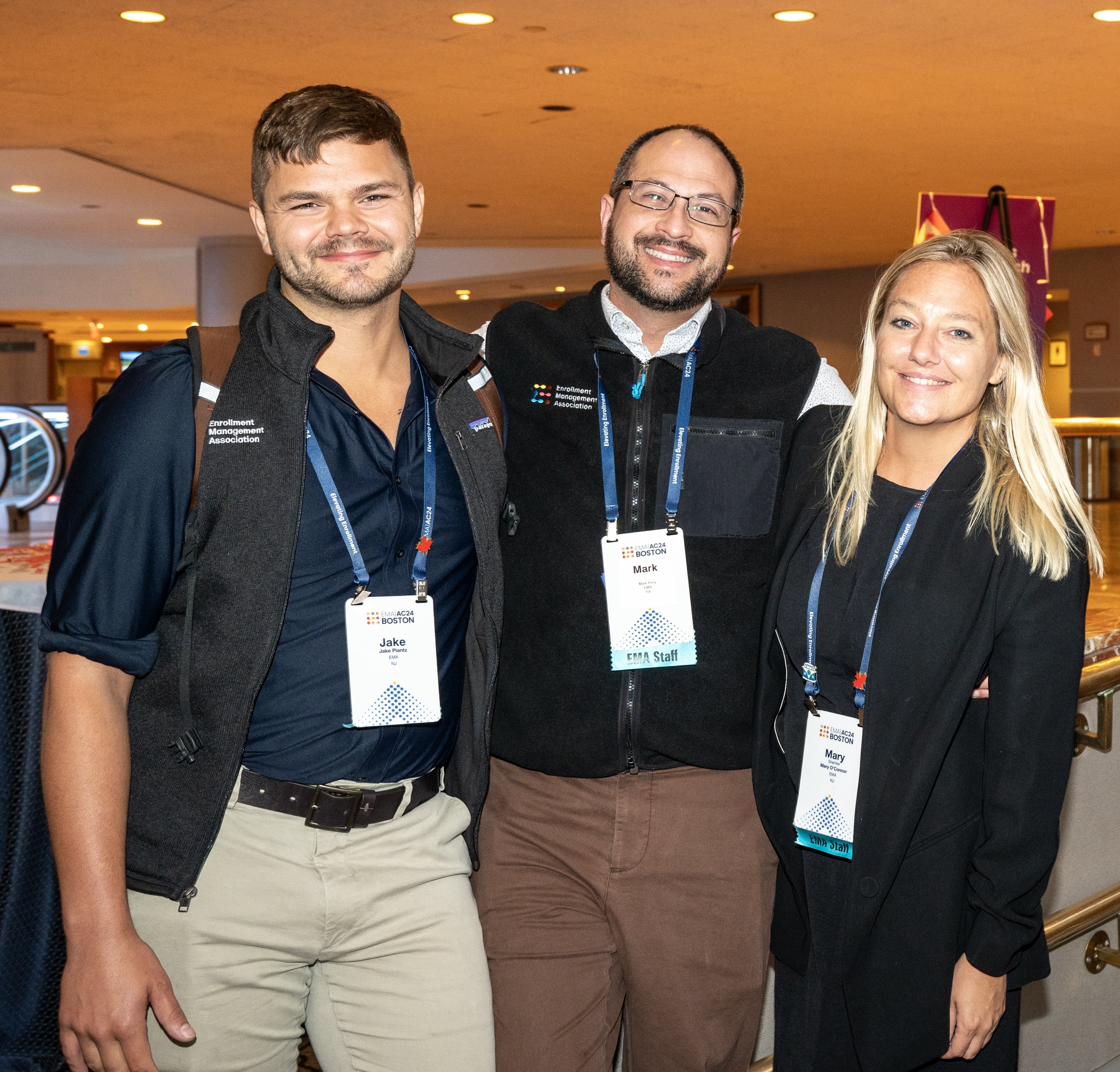 Three EMA employees pose for a photo at the 2024 annual conference